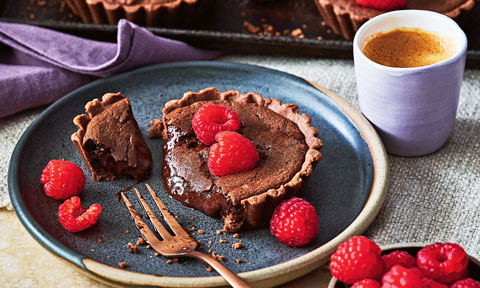 Curtis Stone’s warm chocolate-raspberry hazelnut tarts