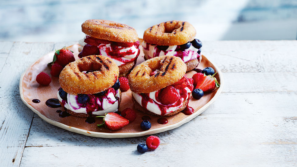 Doughnuts filled with cream and fruit