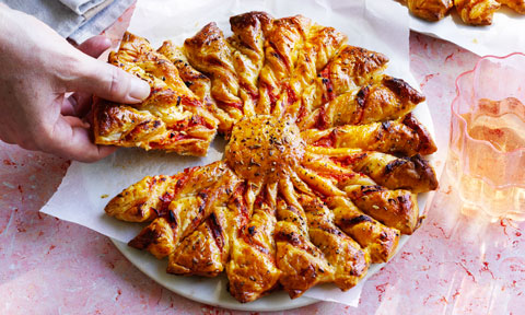 Tomato and fetta tart soleil on a white plate