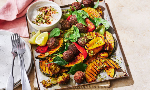 Vegan pumpkin and falafel salad with harissa dressing