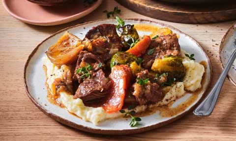 Braised steak and onions