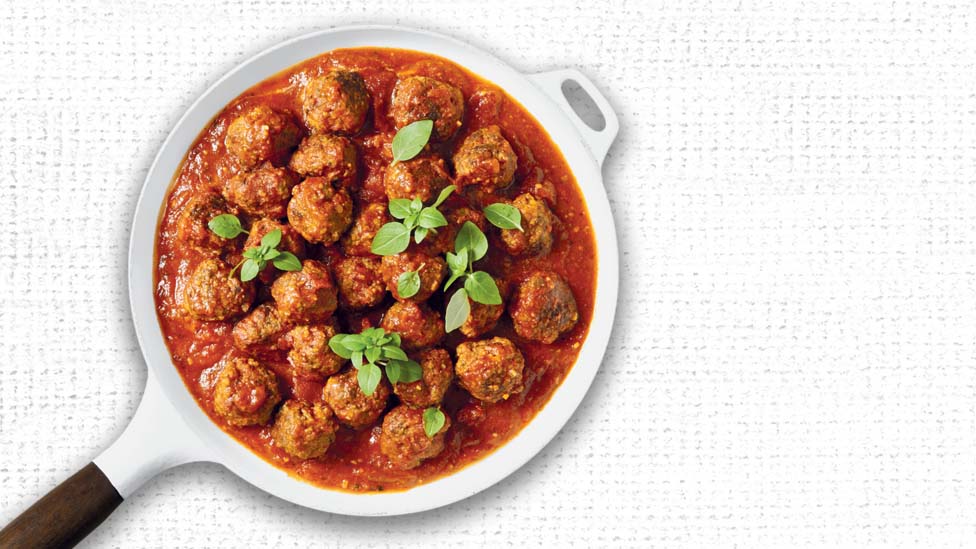 Tuscan meatballs in a white pan