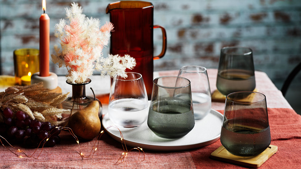 Assorted coloured glassware