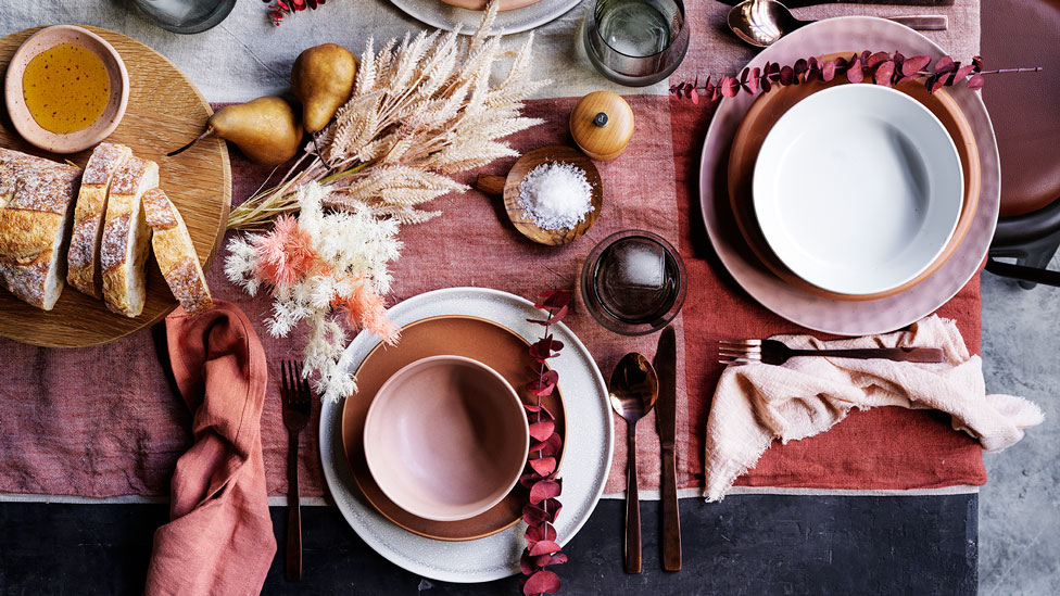 A flat lay shop of assorted plates and bowls