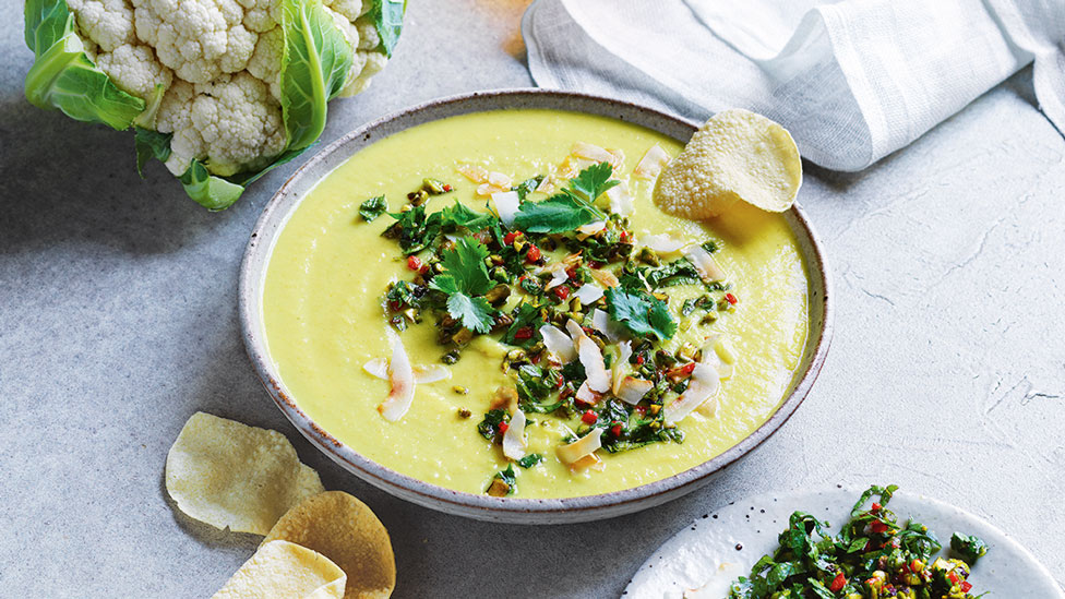 Curried cauliflower soup with pistachio sambal