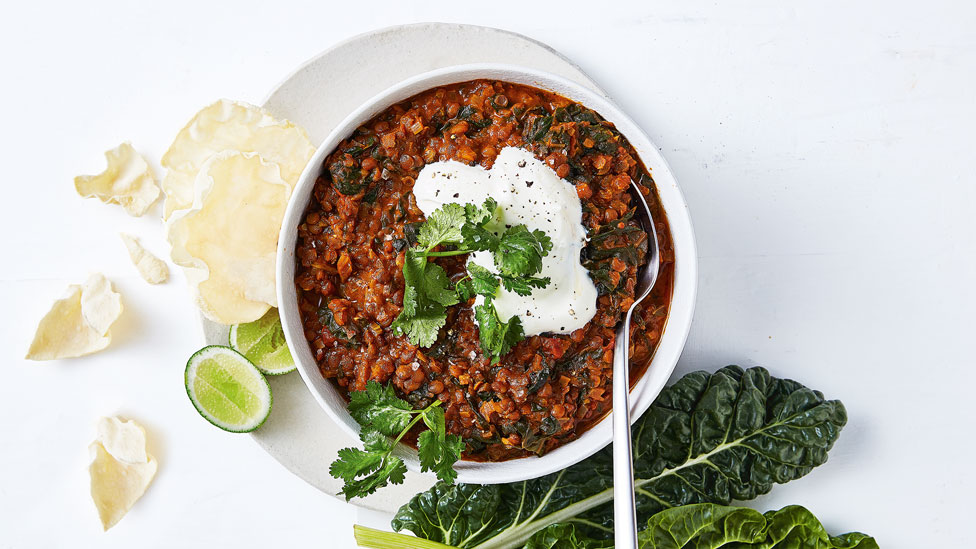 Silverbeet dahl with yoghurt and lime cheeks
