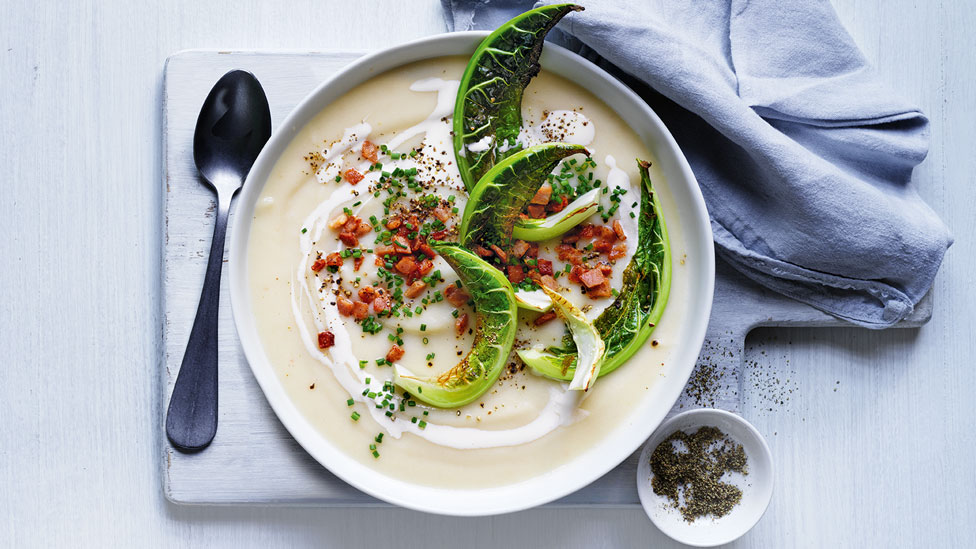 Whole cauliflower soup with bacon and chives