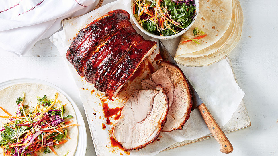 A cut of smoky bbq pork with a bourbon glaze