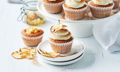 Apple pie cupcakes with apple chips and ground cinnamon