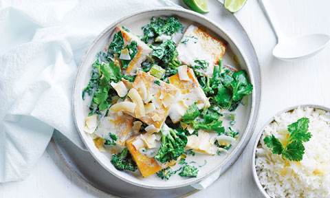 Tofu green curry with coconut flakes