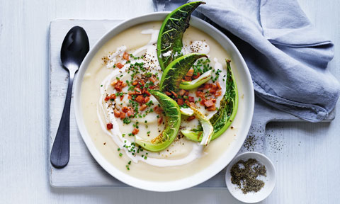 Whole cauliflower soup with bacon and chives