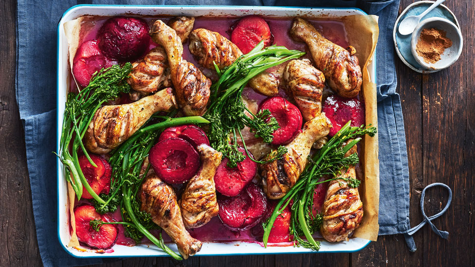 Spiced chicken and plum tray bake