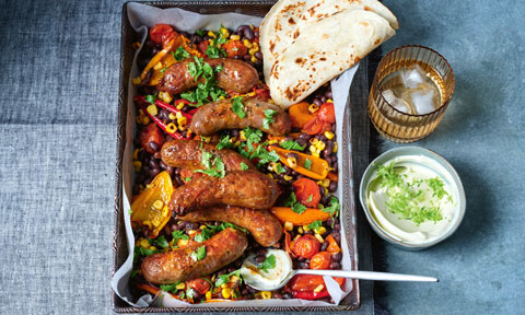 Tex-Mex sausage tray bake with lime sour cream