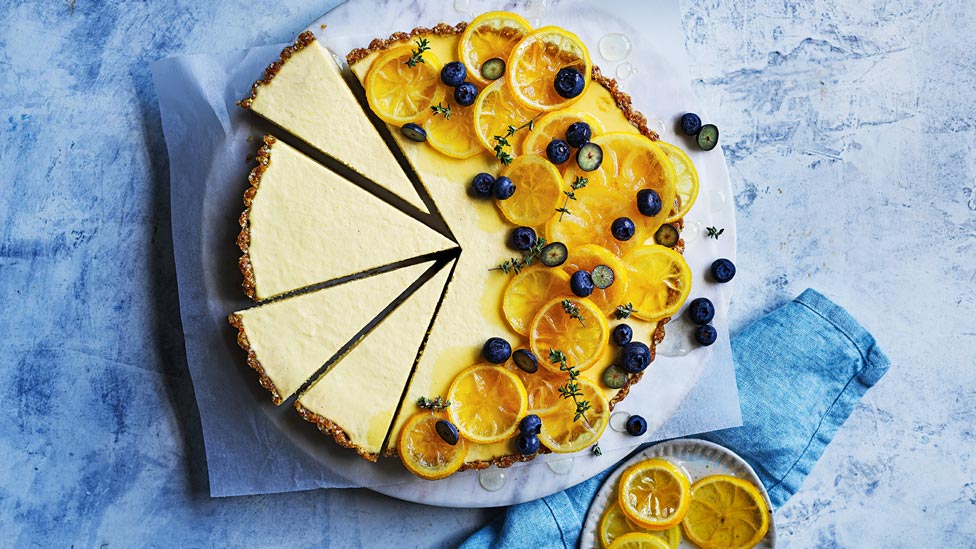 Lemon and blueberry vegan tart cut in pieces