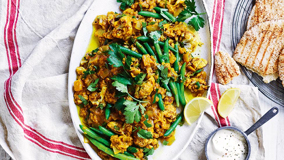 A dish of roasted cauliflower dahl