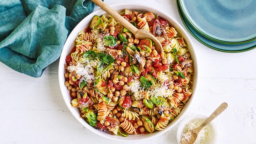 A bowl of tomato and chickpea pasta