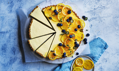 Lemon and blueberry vegan tart cut in pieces