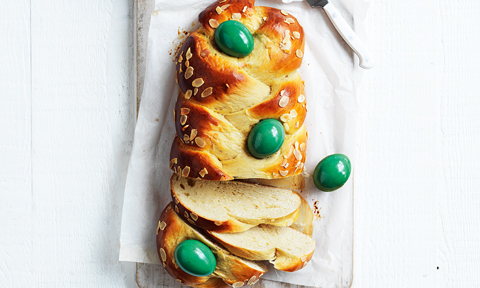 Greek easter bread with dyed eggs on top