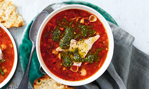 A bowl of minestrone with pesto