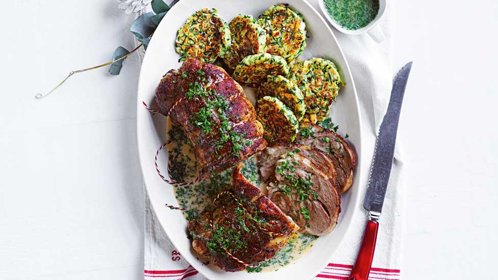 Herbed lamb roast with zucchini-fetta fritters