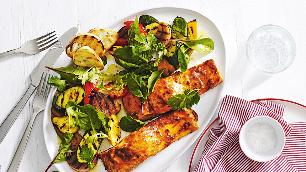 Baked fish with harissa vegetable salad