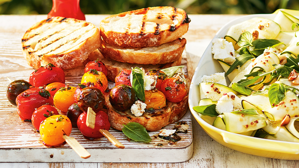 Chargrilled cherry tomatoes on skewers, served with chargrilled bread