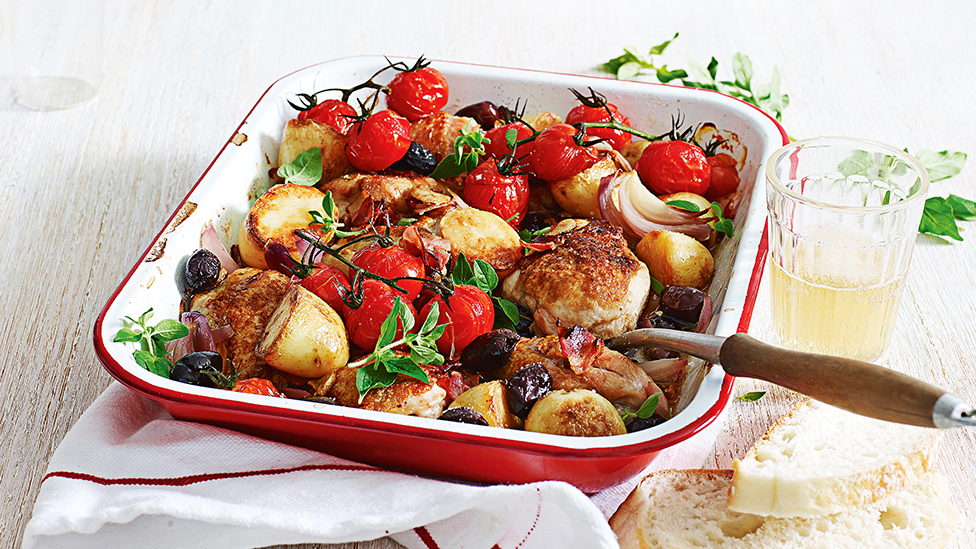 Tray bake of chicken, potatoes, olives and cherry tomatoes