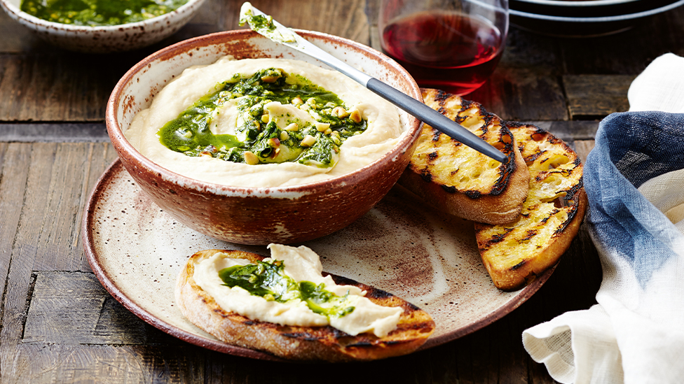Caramelised parsnip and white bean spread with herb oil and toasties