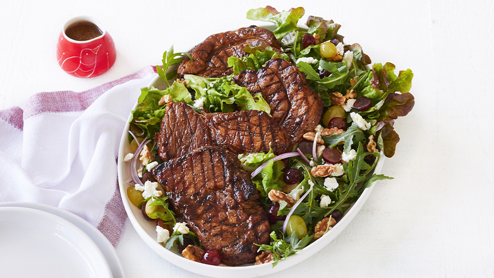 Caramelised pork with pickled grape salad