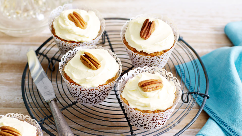 Carrot and pineapple cupcakes with cream cheese frosting