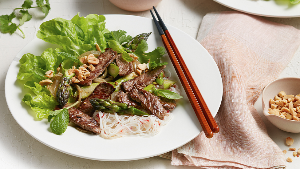 Chilled noodle salad with wok-seared beef and asparagus