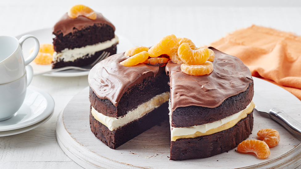 Chocolate layer cake with mandarin curd