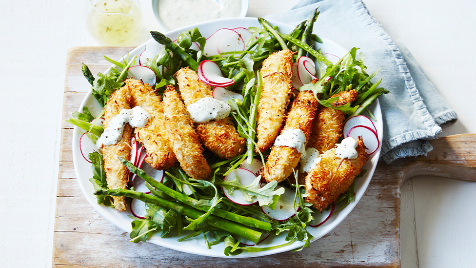 Coconut-crusted chicken with spring salad