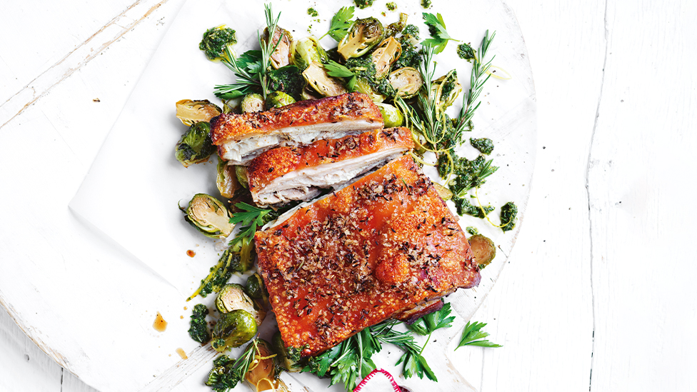 Crispy-skin pork belly with rosemary salsa verde