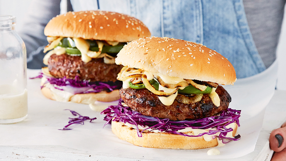 Curtis Stone's BBQ lamb burgers with charred onion and capsicum