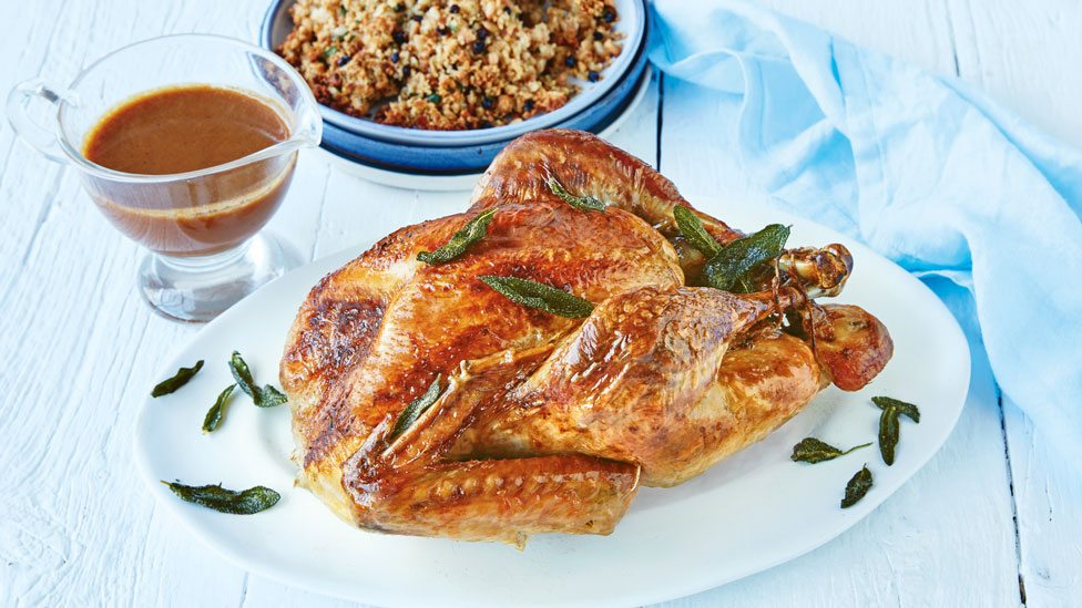 Curtis Stone's roast turkey with sage-brown butter gravy and currant-pine nut stuffing