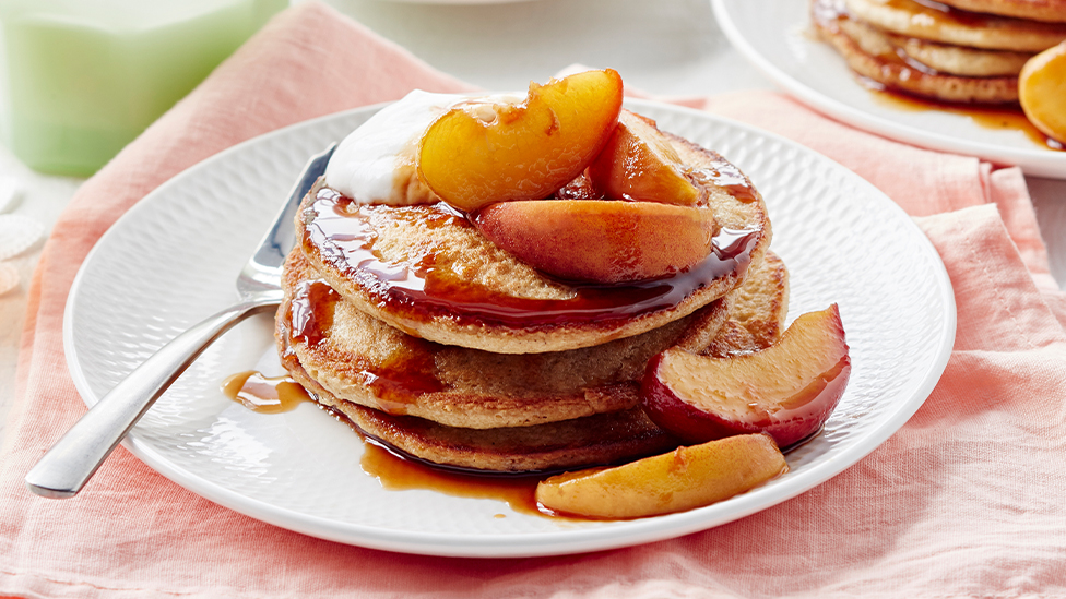 Dairy-free oat pancakes with peach compote