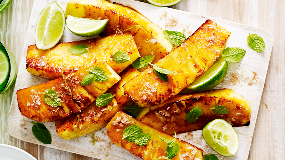 Grilled pineapple wedges with lime and cinnamon salt