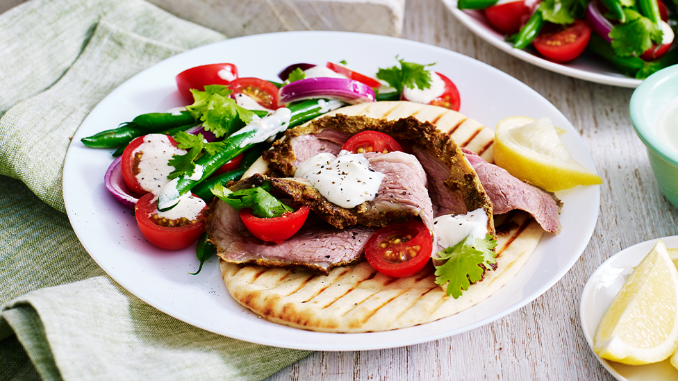 Indian-spiced lamb with green bean and yoghurt salad