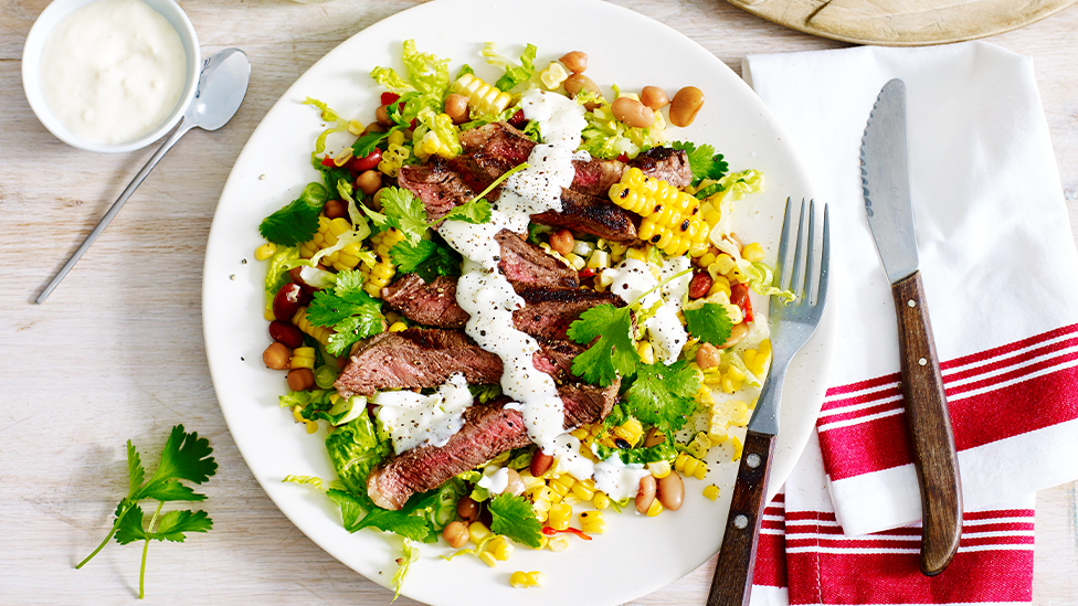 Jerk beef with warm corn and bean salad