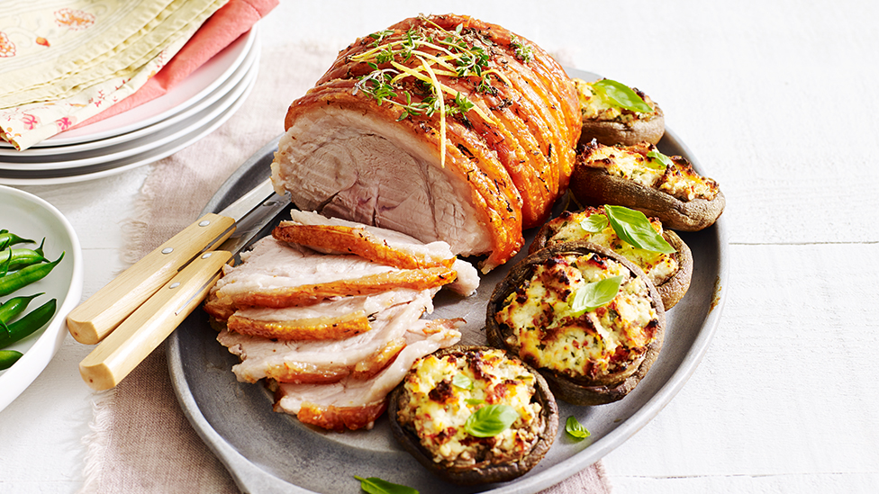 Lemon and thyme roast pork with ricotta stuffed mushrooms