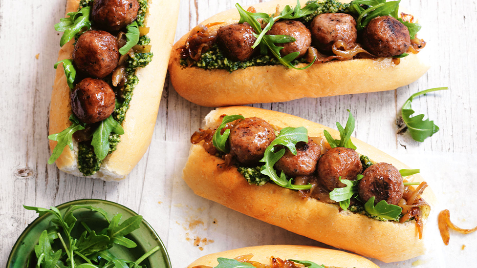 Meatball subs with caramelised fennel and rocket pesto