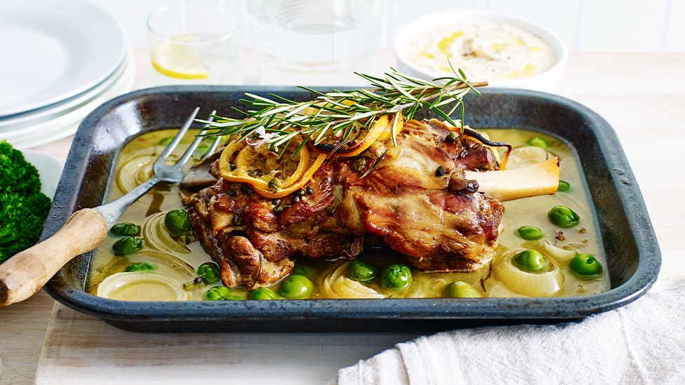 Mediterranean lamb shoulder roast with lemon, olives and white wine