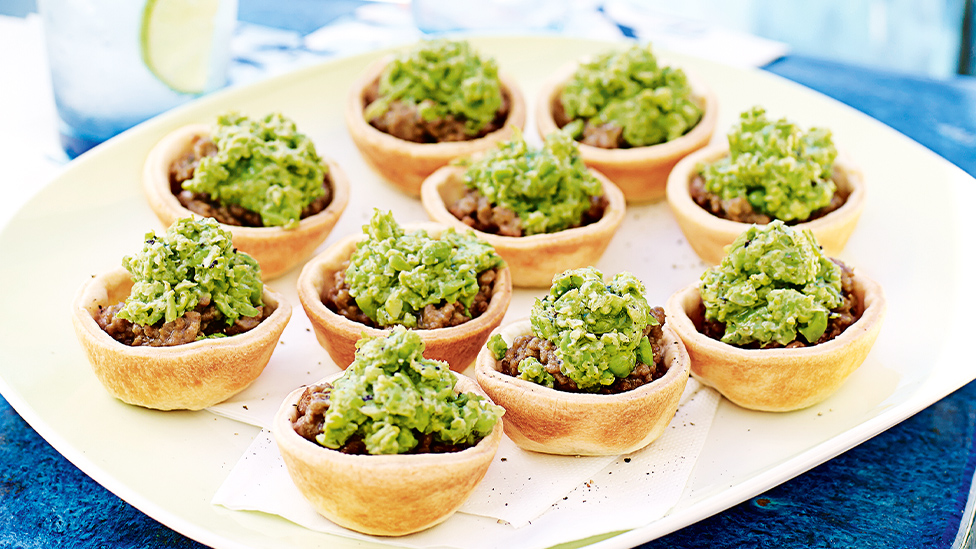 Mini lamb pies with smashed peas
