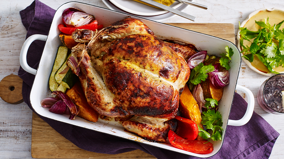 Moroccan roast chicken with apricot and pistachio couscous stuffing