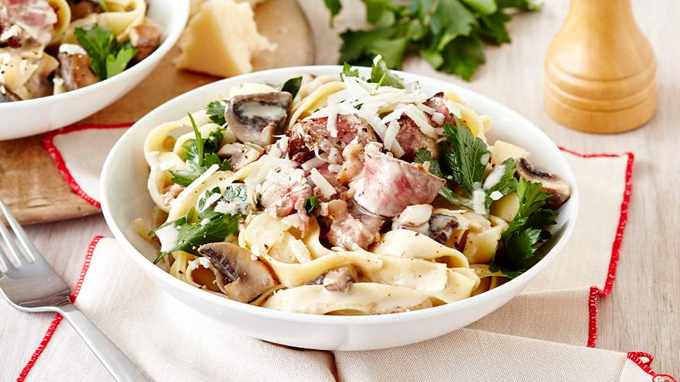 Mustard-crusted beef with creamy mushroom pasta