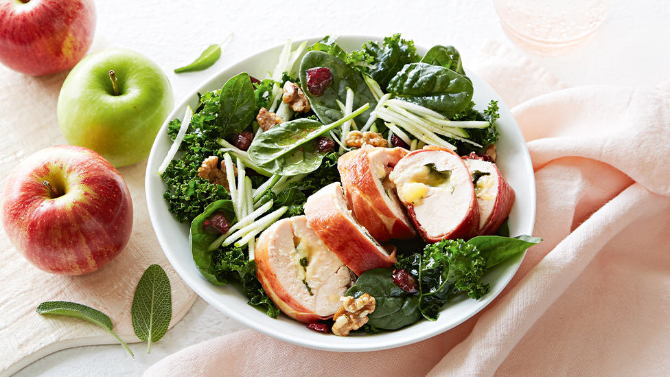 Nutty kale and apple salad with vintage cheddar stuffed chicken