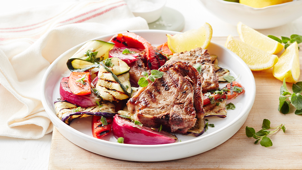 Oregano and lemon lamb with blackened vegetables
