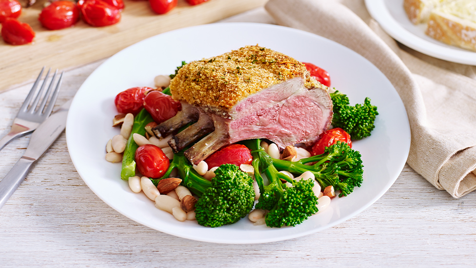 Parmesan-crusted lamb with baby broccoli and white bean salad