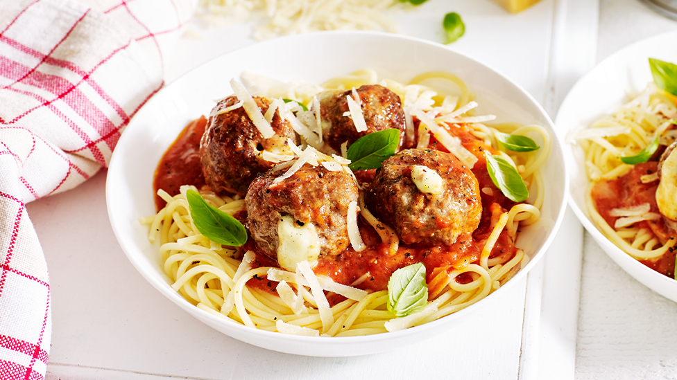 Pasta with cheese-stuffed meatballs